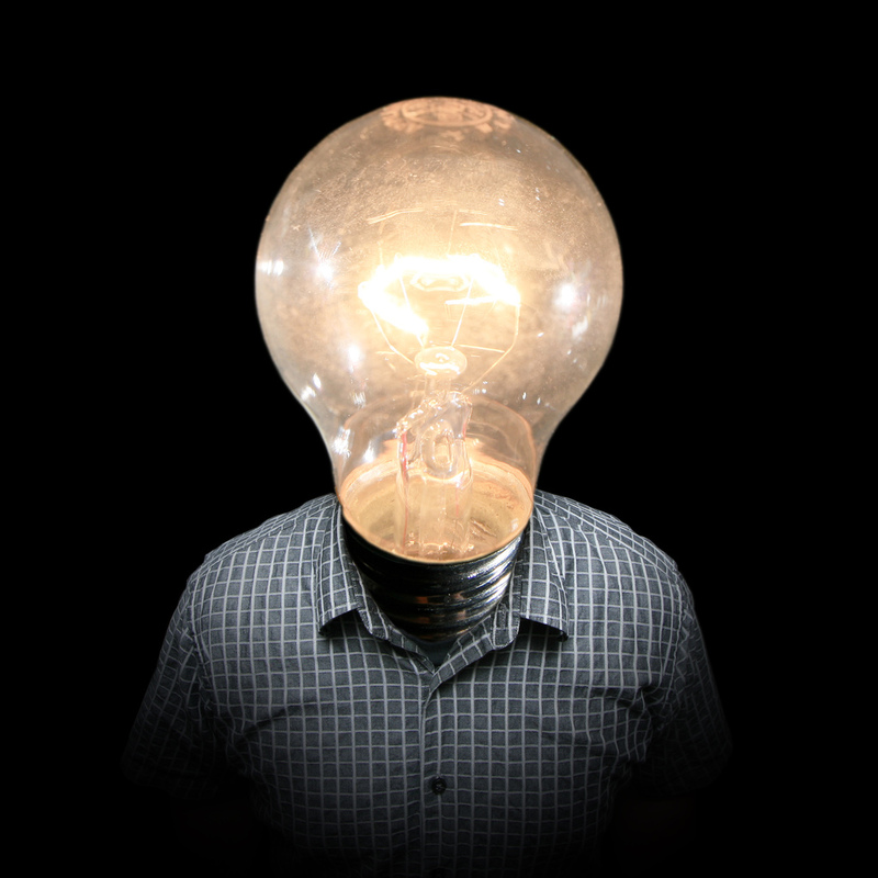 A person with a light bulb in place of a head. A person with a light bulb in place of a head.