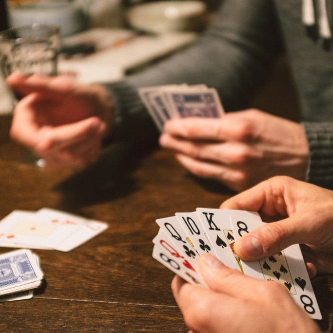 A poker hand shows two pairs. A poker hand shows two pairs.