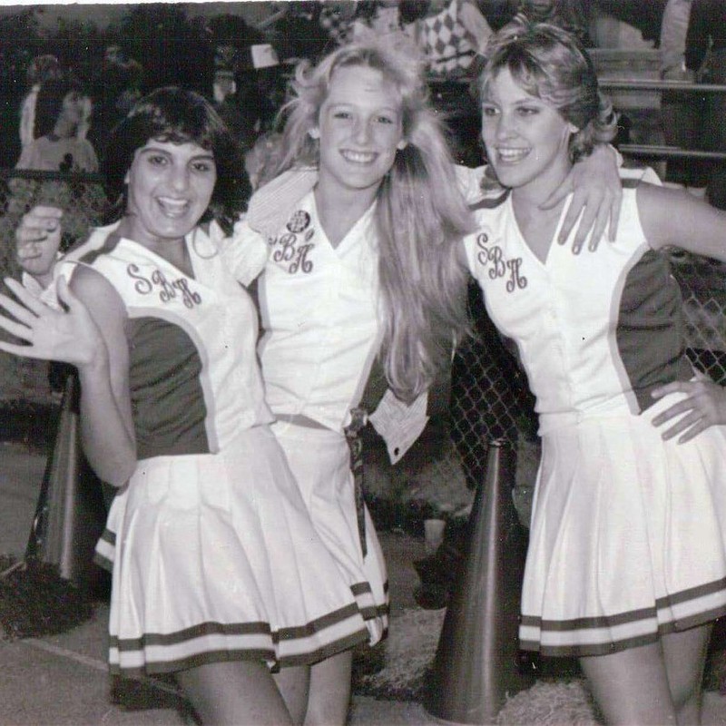 Cheerleaders pictured in a 1980s high school yearbook. Cheerleaders pictured in a 1980s high school yearbook.