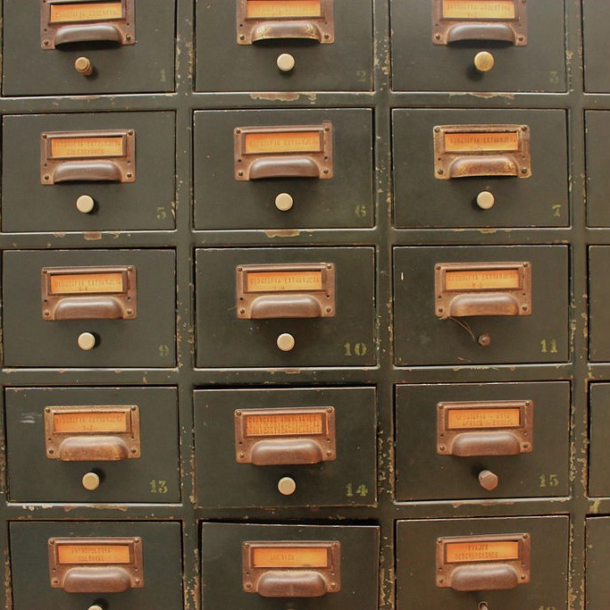 A series of numbered file drawers like those that were common in libraries. A series of numbered file drawers like those that were common in libraries.