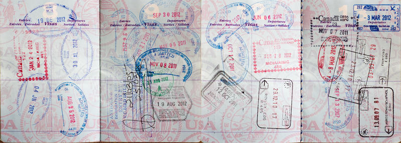 A passport full of stamps. A passport full of stamps.