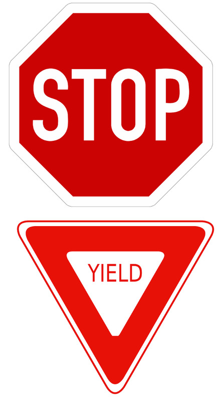 A stop sign and a yield sign. A stop sign and a yield sign.