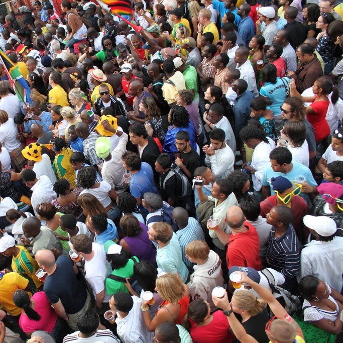 A huge crowd of people stand shoulder to shoulder during the 2010 World Cup. A huge crowd of people stand shoulder to shoulder during the 2010 World Cup.