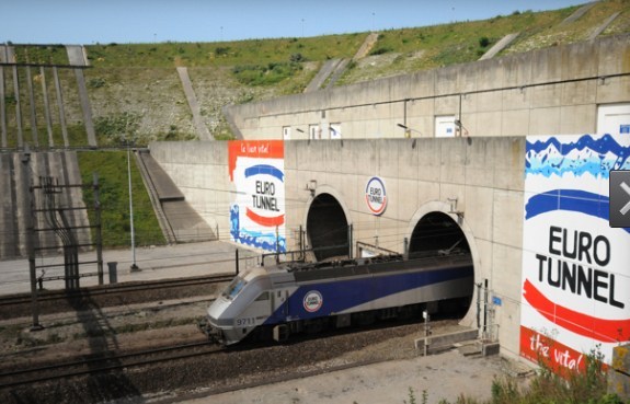 A train exits the Channel Tunnel. A train exits the Channel Tunnel.