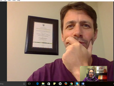 A therapist conducting an online session with a patient using video software. A therapist conducting an online session with a patient using video software.